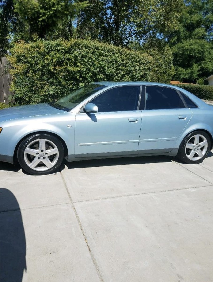 Mobile auto repair in Huntington Beach, mechanic working under a car