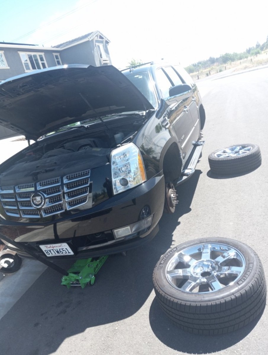 Mobile mechanic brake and tire work at a Huntington Beach curb